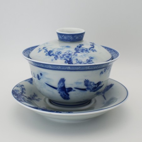 Hand-painted flower and bird teacup with saucer and lid