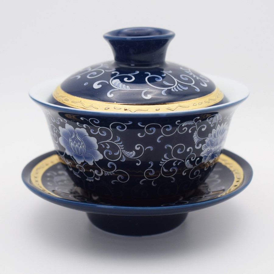Enamel teacup with lid and tea tray