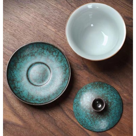 Ancient green glaze covered bowl