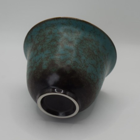 Ancient green glaze covered bowl