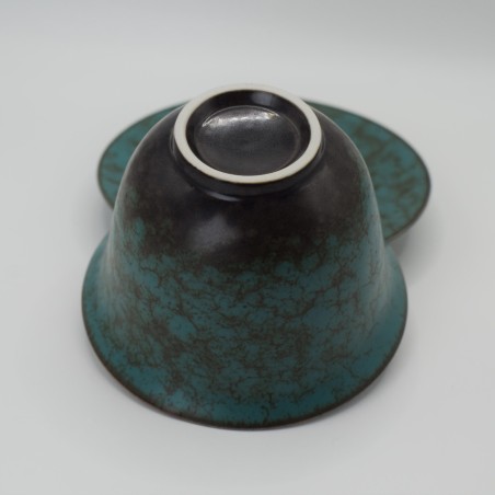 Ancient green glaze covered bowl