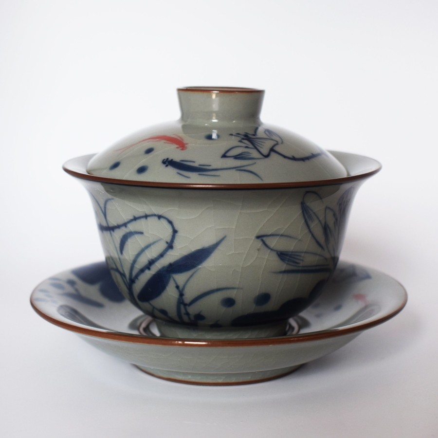 Hand-painted lotus and fish pattern teacup