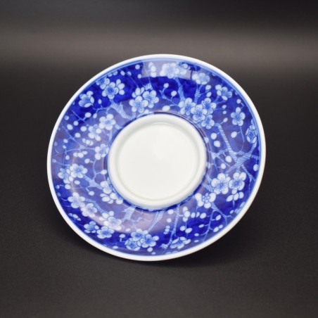 Hand-painted floral blue and white porcelain teacup and saucer