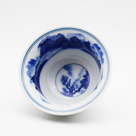 Porcelain teacup with hand-painted figures