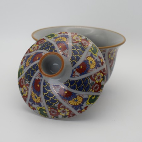 Hand-painted floral cover with saucer and cover