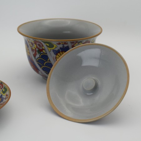 Hand-painted floral cover with saucer and cover