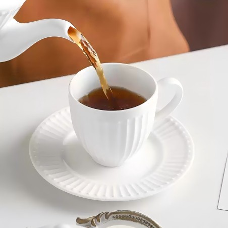 Classic white porcelain coffee cup and saucer