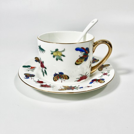 Vintage floral porcelain coffee cup and sauceR