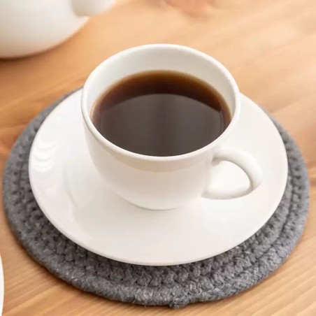 Smooth white ceramic coffee cup and saucer